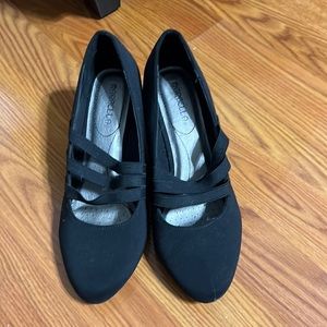 Black three strapped high heel sized 8 1/2 W. Only worn twice.